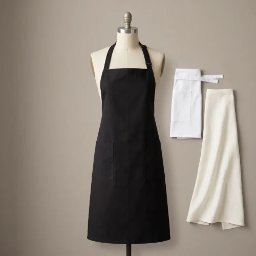 Restaurant aprons: black chef bib apron, white waist apron and ivory bistro apron by International Linens