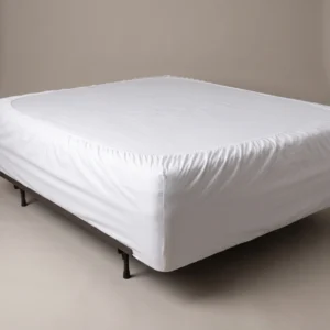 Bariatric bed sheets: wide white fitted sheet on a bariatric hospital bed by International Linens
