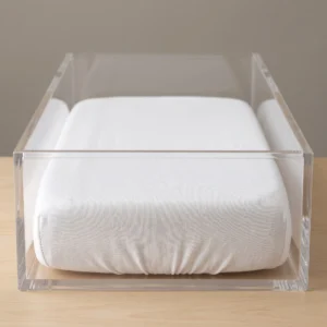 Crib sheets: white knitted fitted crib sheet on a hospital bassinet mattress by International Linens