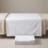 Hospital draw sheets: white woven draw sheet across a hospital bed by International Linens