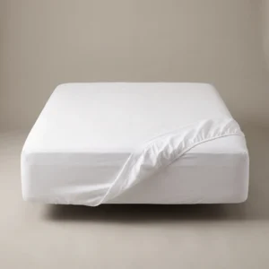 Hotel fitted sheets: white deep-pocket fitted sheet on a hotel mattress by International Linens