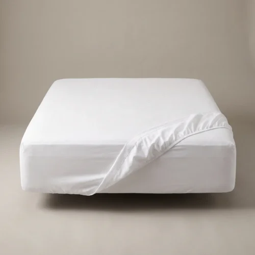 Hotel fitted sheets: white deep-pocket fitted sheet on a hotel mattress by International Linens