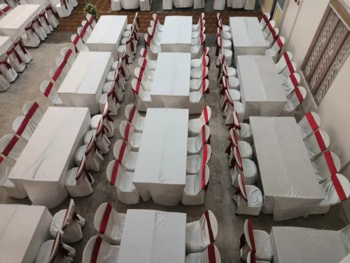 Banquet tables with white tablecloths