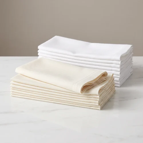Restaurant cloth napkins: ivory spun polyester dinner napkins by International Linens