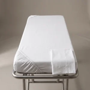 Stretcher sheets: white fitted sheet on a hospital gurney by International Linens