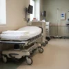 Stretcher sheets in use: white fitted sheet on a hospital gurney by International Linens
